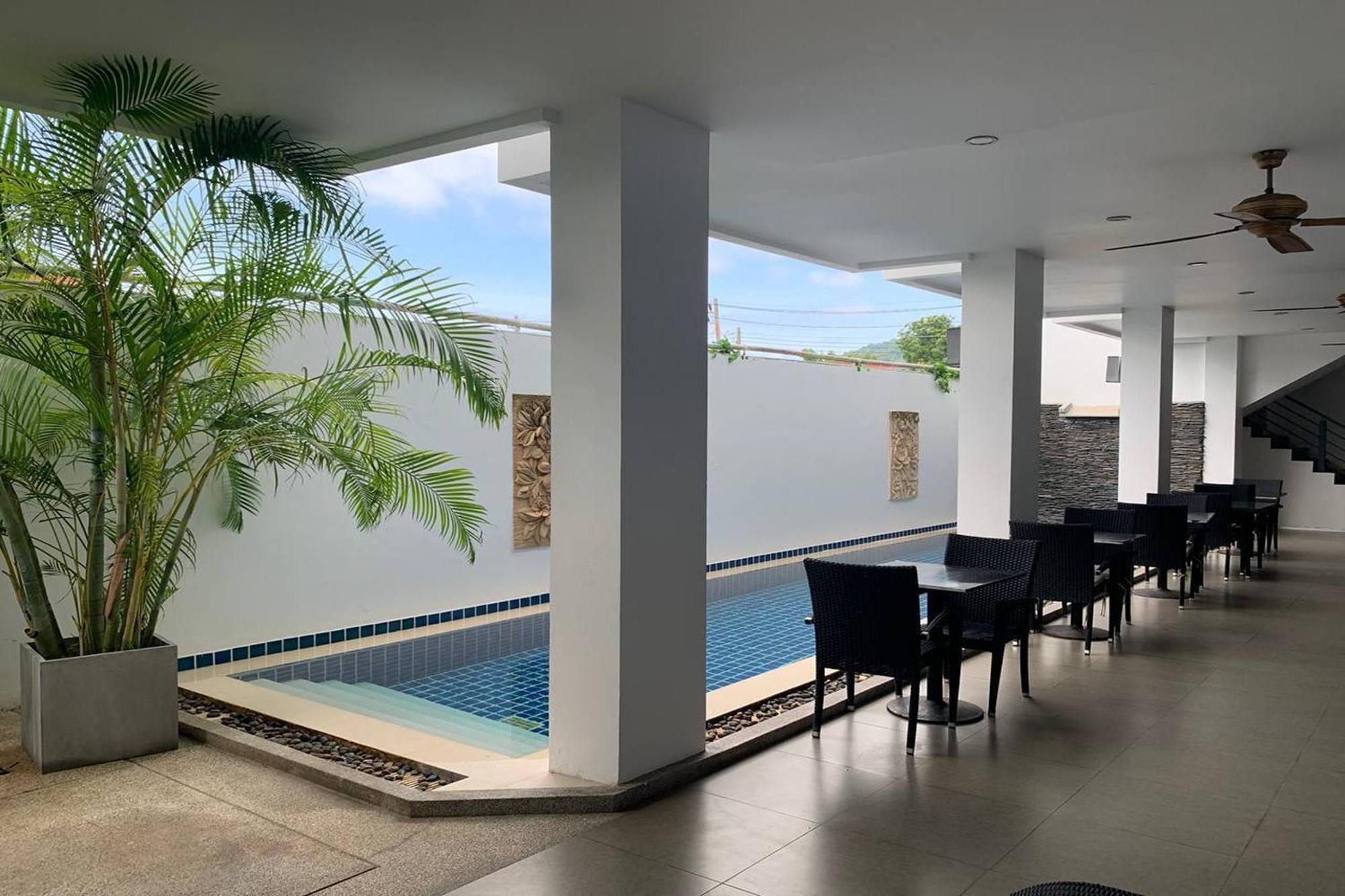 One World One Home Naiharn Hotel Rawai Exterior photo