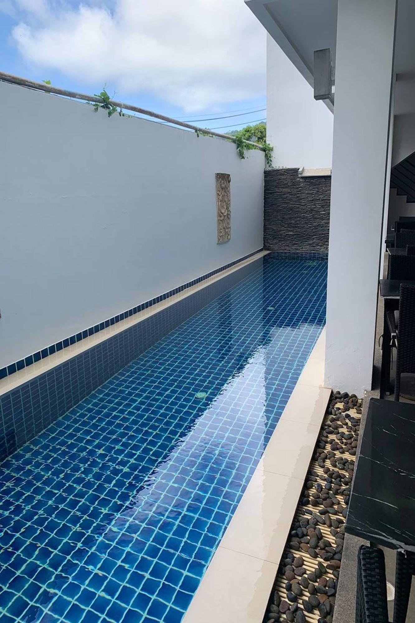 One World One Home Naiharn Hotel Rawai Exterior photo