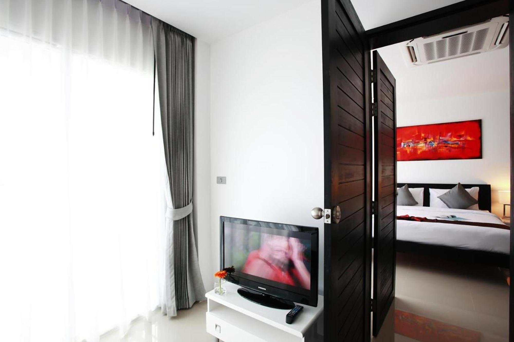 One World One Home Naiharn Hotel Rawai Exterior photo