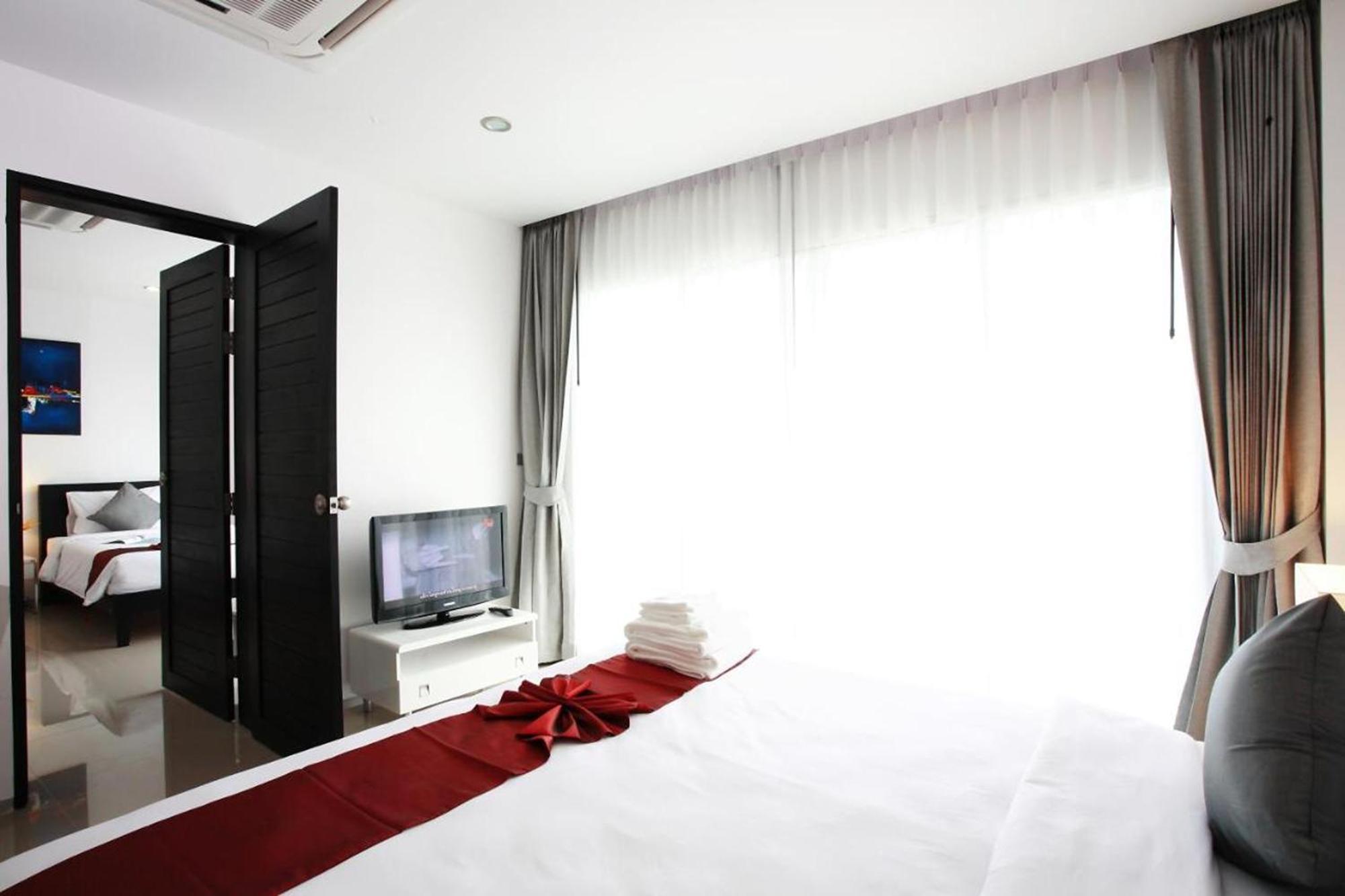 One World One Home Naiharn Hotel Rawai Exterior photo